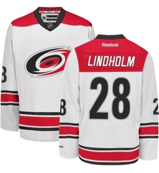 Youth Reebok Carolina Hurricanes #28 Elias Lindholm Authentic White Away NHL Jersey